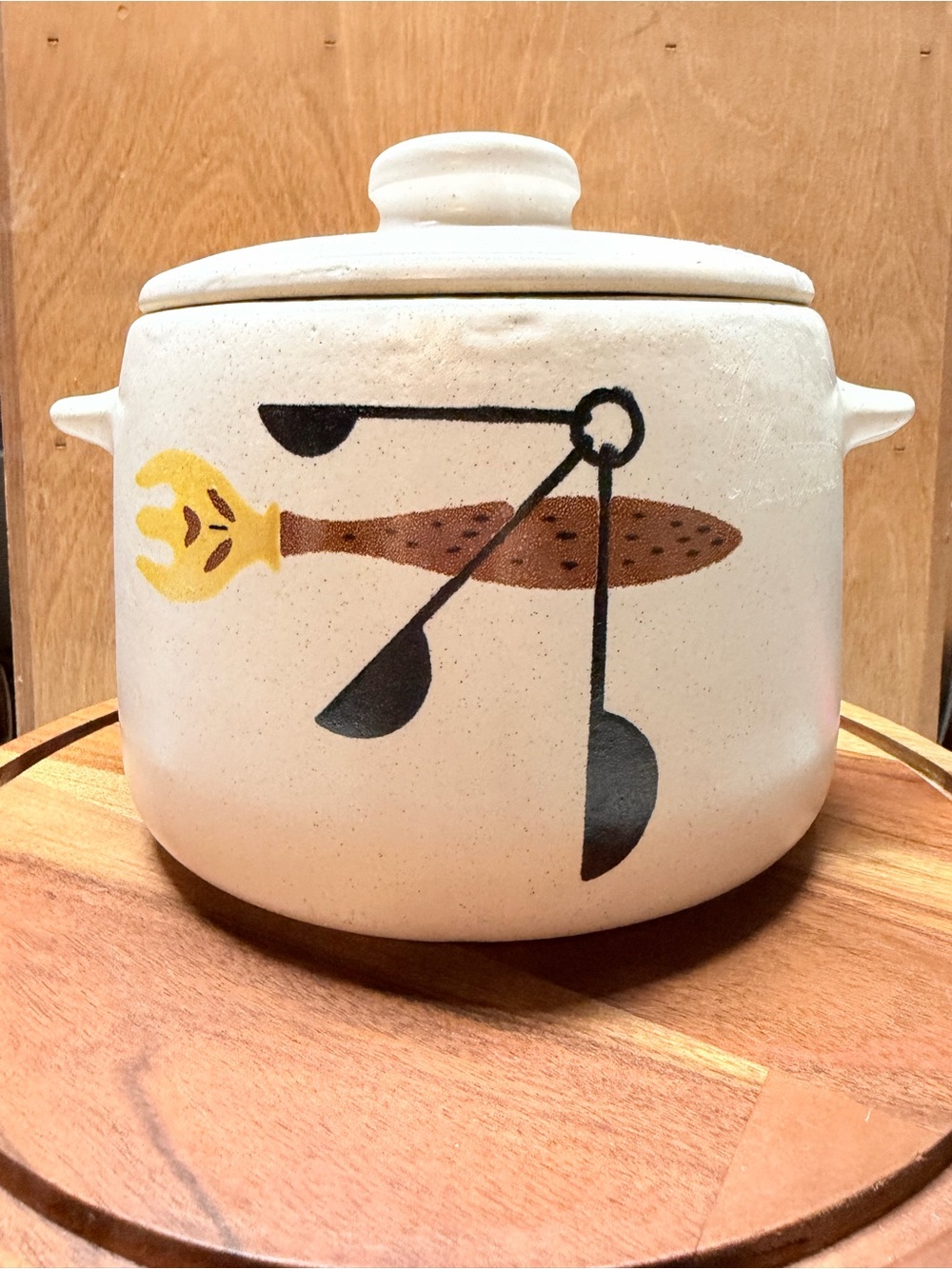 West Bend Ceramic Lidded Kitchen Canister in Cream with Yellow and Brown Motif